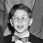 Leonard as kid crossing his eyes